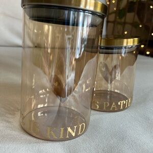 Two Gold Glass Storage Jars,